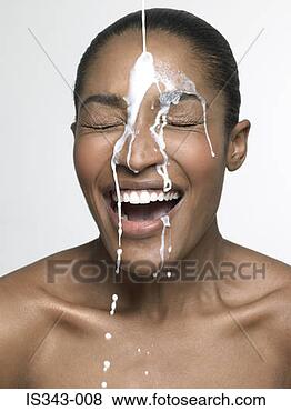 Stock Photo - milk pouring onto 
woman. fotosearch 
- search stock 
photos, pictures, 
images, and photo 
clipart