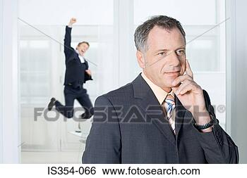 Stock Photo - businessmen thinking 
and jumping. fotosearch 
- search stock 
photos, pictures, 
images, and photo 
clipart
