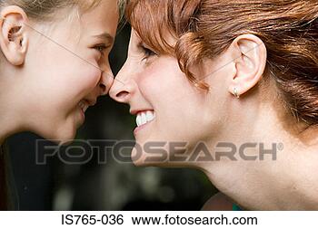 Stock Photo - mother and daughter 
face to face. 
fotosearch - search 
stock photos, 
pictures, images, 
and photo clipart