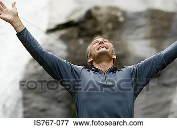 Picture - triumphant man. 
fotosearch - search 
stock photos, 
pictures, images, 
and photo clipart