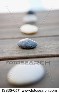Picture - pebbles in a row. 
fotosearch - search 
stock photos, 
pictures, images, 
and photo clipart