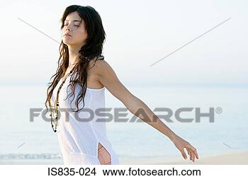 Stock Photo - serene young woman. 
fotosearch - search 
stock photos, 
pictures, images, 
and photo clipart