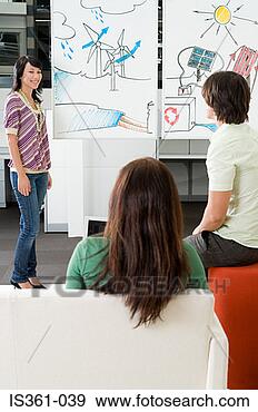 Stock Photograph - woman giving a 
presentation about 
energy. fotosearch 
- search stock 
photos, pictures, 
images, and photo 
clipart