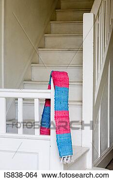 Stock Photo - rug on a banister. 
fotosearch - search 
stock photos, 
pictures, images, 
and photo clipart