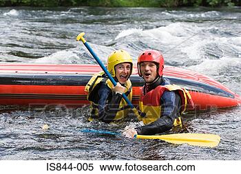 Stock Image - two people white 
water rafting. 
fotosearch - search 
stock photos, 
pictures, images, 
and photo clipart