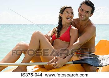 Stock Photo - couple canoeing. 
fotosearch - search 
stock photos, 
pictures, images, 
and photo clipart