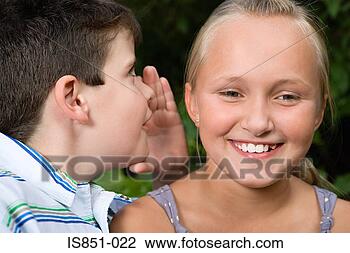 Stock Photo - boy whispering 
to girl. fotosearch 
- search stock 
photos, pictures, 
images, and photo 
clipart