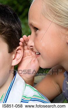 Stock Photo - girl whispering 
to boy. fotosearch 
- search stock 
photos, pictures, 
images, and photo 
clipart