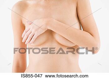 Picture - woman with arm 
across breasts. 
fotosearch - search 
stock photos, 
pictures, images, 
and photo clipart