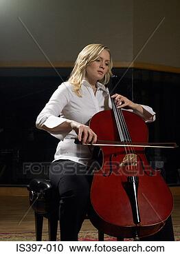 Arquivo de Fotografias - mulher,  tocando, 
 cello. fotosearch 
- busca de fotos, 
imagens e clipart
