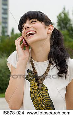 Stock Photo - young woman on 
cellphone. fotosearch 
- search stock 
photos, pictures, 
images, and photo 
clipart