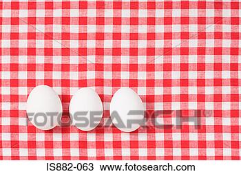 Stock Photo - eggs on a tablecloth. 
fotosearch - search 
stock photos, 
pictures, images, 
and photo clipart