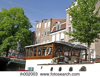 Stock Photo - canal house architecture, 
amsterdam, holland. 
fotosearch - search 
stock photos, 
pictures, images, 
and photo clipart
