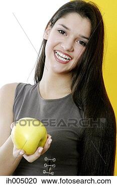 Stock Photography - woman holding 
a green apple. 
fotosearch - search 
stock photos, 
pictures, images, 
and photo clipart