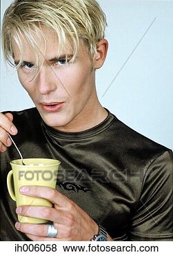 Stock Photo - man strirring 
his cup of coffee. 
fotosearch - search 
stock photos, 
pictures, images, 
and photo clipart