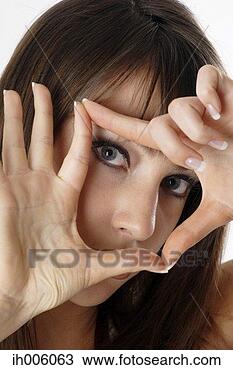 Stock Photo - woman posing for 
the camera. fotosearch 
- search stock 
photos, pictures, 
images, and photo 
clipart