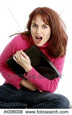 Stock Photo - woman protecting 
her bag. fotosearch 
- search stock 
photos, pictures, 
images, and photo 
clipart