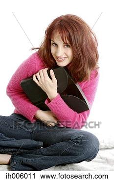 Stock Photography - woman smiling 
at the camera. 
fotosearch - search 
stock photos, 
pictures, images, 
and photo clipart