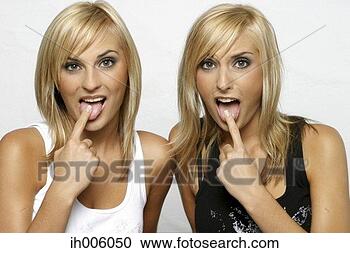 Stock Photography - women showing 
their tongues. 
fotosearch - search 
stock photos, 
pictures, images, 
and photo clipart