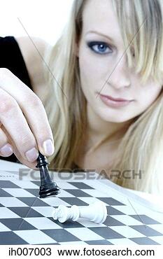 Stock Photo - woman playing 
chess game. fotosearch 
- search stock 
photos, pictures, 
images, and photo 
clipart