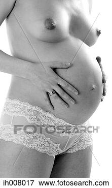 Picture - topless pregnant 
lady. fotosearch 
- search stock 
photos, pictures, 
images, and photo 
clipart