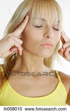 Stock Photography - woman massaging 
her own head. 
fotosearch - search 
stock photos, 
pictures, images, 
and photo clipart