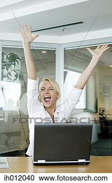 Stock Photography - businesswoman 
rejoicing after 
reading the good 
news in her e-mail. 
fotosearch - search 
stock photos, 
pictures, images, 
and photo clipart