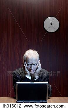 Stock Photo - businessman feeling 
depressed. fotosearch 
- search stock 
photos, pictures, 
images, and photo 
clipart