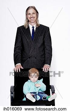 Stock Photograph - businessman and 
his son. fotosearch 
- search stock 
photos, pictures, 
images, and photo 
clipart