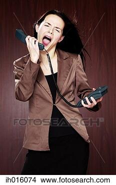 Stock Photo - businesswoman 
screaming into 
the phone. fotosearch 
- search stock 
photos, pictures, 
images, and photo 
clipart