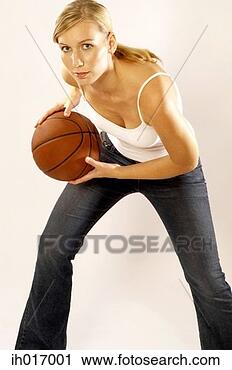 Stock Photography - woman playing 
basketball. fotosearch 
- search stock 
photos, pictures, 
images, and photo 
clipart