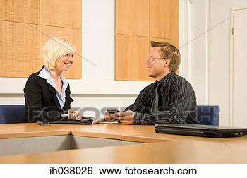 Stock Photo - businessman and 
businesswoman 
in discussion. 
fotosearch - search 
stock photos, 
pictures, images, 
and photo clipart