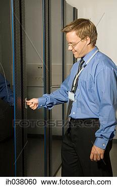 Stock Photography - businessman opening 
a door. fotosearch 
- search stock 
photos, pictures, 
images, and photo 
clipart