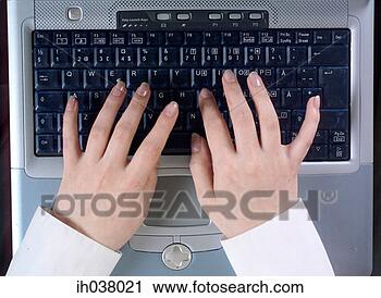 Stock Photography - hands typing on 
laptop. fotosearch 
- search stock 
photos, pictures, 
images, and photo 
clipart