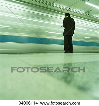 Stock Photo - a train arriving 
at a station. 
fotosearch - search 
stock photos, 
pictures, images, 
and photo clipart