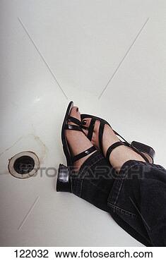 Stock Photo - bathroom, tub, 
bath, clothed, 
jeans, ankle. 
fotosearch - search 
stock photos, 
pictures, images, 
and photo clipart