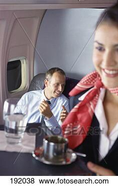 Stock Photo - stewardess, air, 
airplane, sat, 
flyers. fotosearch 
- search stock 
photos, pictures, 
images, and photo 
clipart
