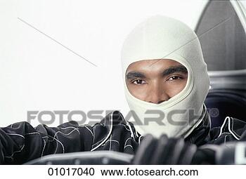 Arquivo de Fotografias - fórmula,  motorista, 
 sentando,  cabina 
piloto,  seu, 
 car,  desgastar. 
fotosearch - busca 
de fotos, imagens 
e clipart