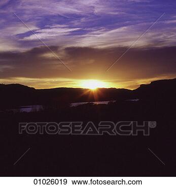Stock Photograph - a rural sunset. 
fotosearch - search 
stock photos, 
pictures, images, 
and photo clipart