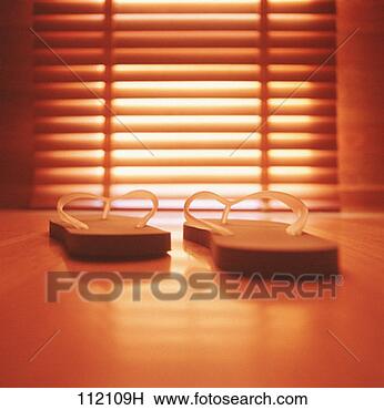 Stock Photo - close up of flip 
flop sandals. 
fotosearch - search 
stock photos, 
pictures, images, 
and photo clipart