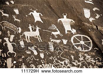 Stock Photo - ancient rock drawings, 
newspaper rock 
state historic 
park, utah, usa. 
fotosearch - search 
stock photos, 
pictures, images, 
and photo clipart
