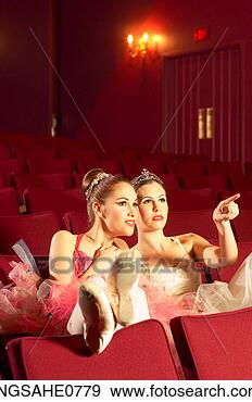 Stock Photograph - two ballerinas 
sitting in red 
theater. fotosearch 
- search stock 
photos, pictures, 
images, and photo 
clipart