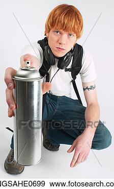 Stock Photograph - youth holding 
spray paint can. 
fotosearch - search 
stock photos, 
pictures, images, 
and photo clipart