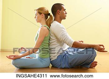 Stock Photography - two women in boat 
pose while practicing 
partner yoga. 
fotosearch - search 
stock photos, 
pictures, images, 
and photo clipart