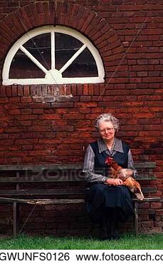Stock Photo - old woman with 
chicken. fotosearch 
- search stock 
photos, pictures, 
images, and photo 
clipart