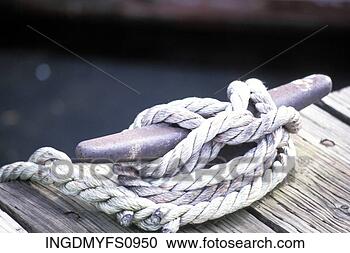 Stock Photography - rope tied to dock. 
fotosearch - search 
stock photos, 
pictures, images, 
and photo clipart