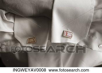 Stock Photo - close-up of the 
cufflinks on a 
shirt sleeve. 
fotosearch - search 
stock photos, 
pictures, images, 
and photo clipart