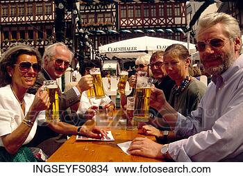 Stock Photo - people drinking 
beer in germany. 
fotosearch - search 
stock photos, 
pictures, images, 
and photo clipart