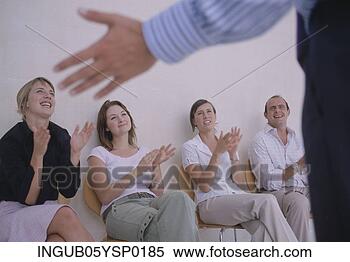 Stock Image - group of business 
executives clapping 
at a presentation. 
fotosearch - search 
stock photos, 
pictures, images, 
and photo clipart