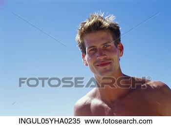 Stock Image - portrait of a 
young man smiling. 
fotosearch - search 
stock photos, 
pictures, images, 
and photo clipart